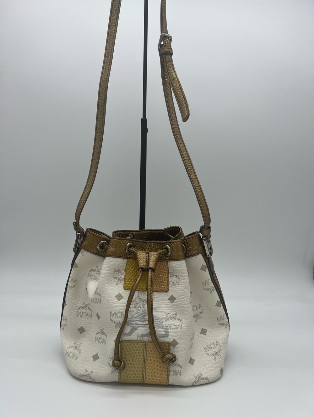 Authentic MCM White Visetos Drawstring Bucket Bag Metallic Bronze Trim - Picture 2 of 8